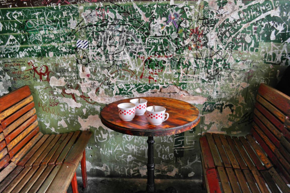 Coffee cups decorated with red dots in Szimpla Kert Ruin Bar