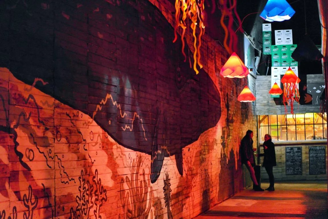 Urban-art interior of Kuplung, a ruin bar in a former car-mechanic workshop, Budapest
