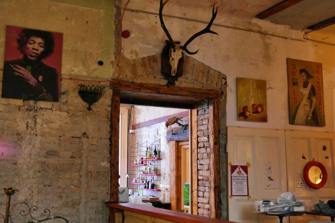 Salvaged, mismatched decor in a side room of Szimpla Kert ruin bar, Budapest