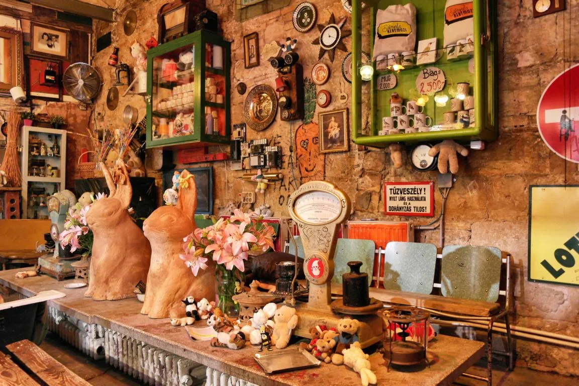 Brick archways and eclectic decor inside Szimpla Kert, Budapest's first ruin bar